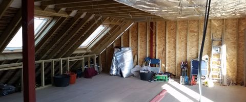 The floor goes down and support walls are built The floor goes down and support walls are built